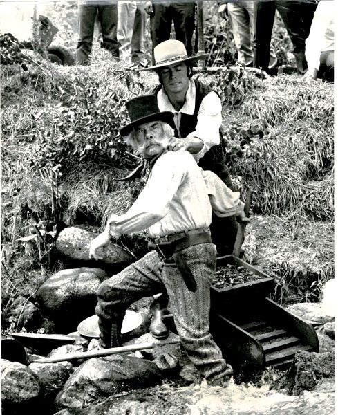 Publicity Photo/Still: CLINT EASTWOOD - PAINT YOUR WAGON 1970 Clint Holds Lee Publicity Photo/Still: CLINT EASTWOOD - PAINT YOUR WAGON 1970 Clint Holds Lee