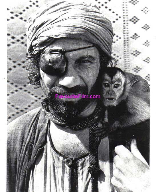 RAIDERS OF THE LOST ARK: B/W Still Baddie with Monkey