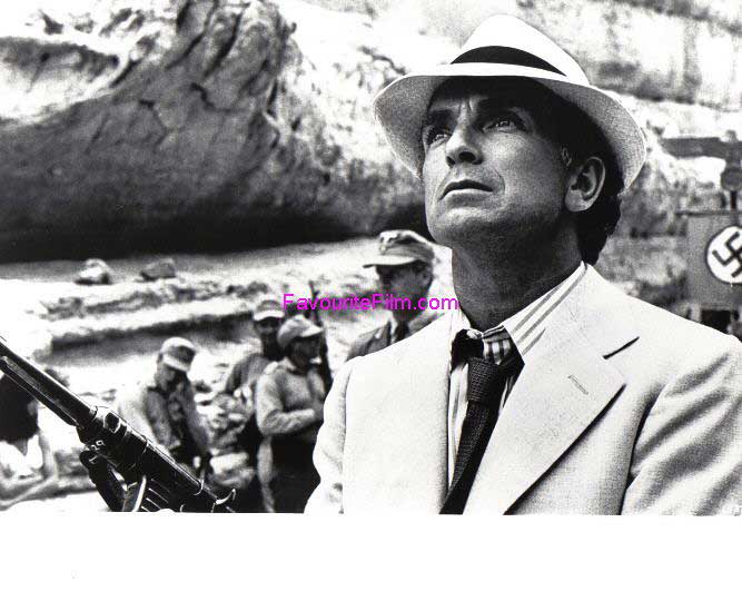 RAIDERS OF THE LOST ARK: B/W Still Dr. Rene Belloq Looks Up
