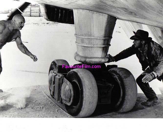 RAIDERS OF THE LOST ARK: B/W Still Indiana Jones & German Mechanic