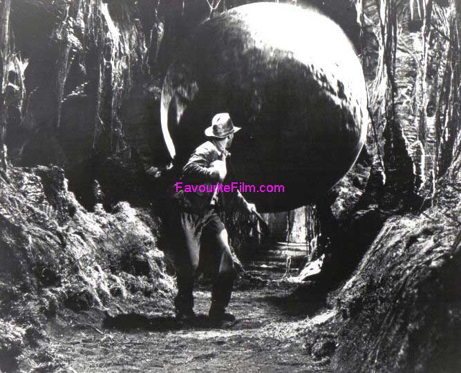 RAIDERS OF THE LOST ARK: B/W Still Indy Runs From Rolling Rock