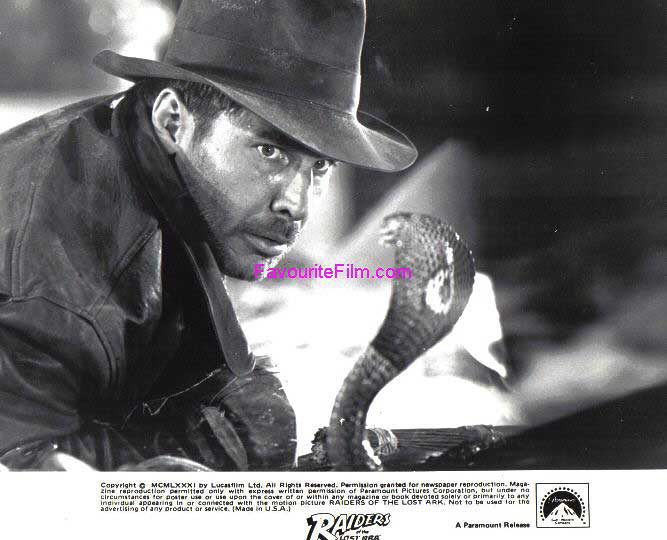 RAIDERS OF THE LOST ARK: B/W Still Indy Faces Snake 