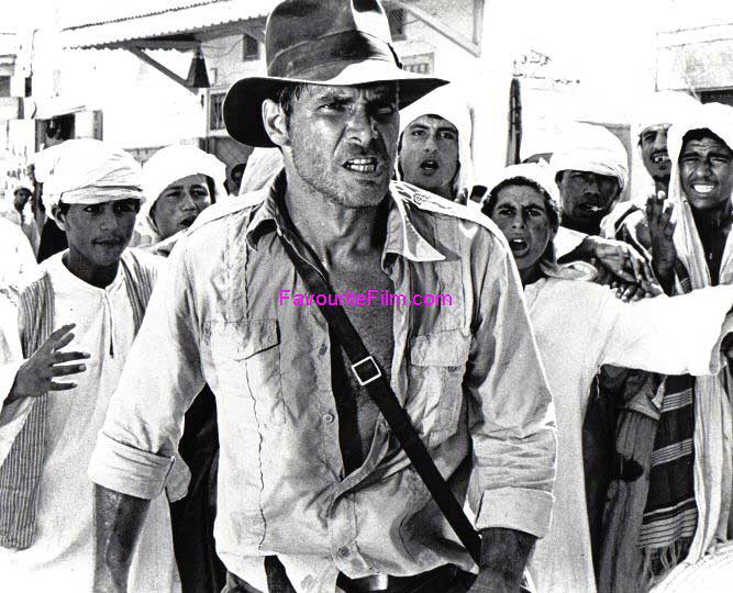 RAIDERS OF THE LOST ARK: B/W Still Indy In Cairo Market