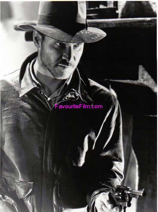 RAIDERS OF THE LOST ARK: B/W Still Indy Points Gun