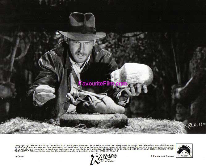 RAIDERS OF THE LOST ARK: B/W Still Indy Weighs Up Statue