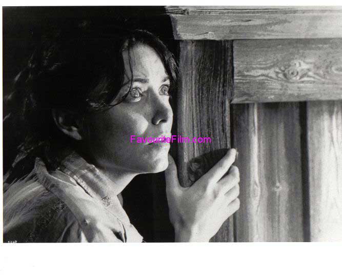 RAIDERS OF THE LOST ARK: B/W Still Marion Looks From Door