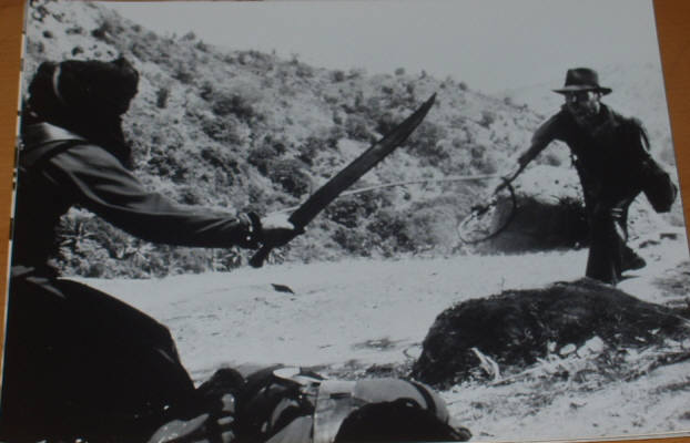 INDIANA JONES AND THE TEMPLE OF DOOM: B/W Still Whip v Blade