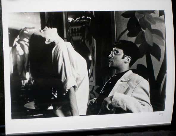 EXOTICA: Publicity Still 2 Guy in Chair Plus Girl EXOTICA: Publicity Still 2 Guy in Chair Plus Girl