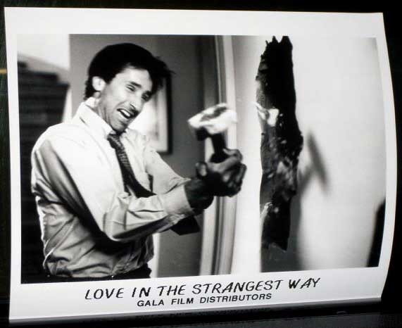 LOVE IN THE STRANGEST WAY: Publicity Still Man Hitting Wall LOVE IN THE STRANGEST WAY: Publicity Still Man Hitting Wall