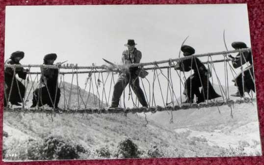 INDIANA JONES AND THE TEMPLE OF DOOM: B/W Still Fighting on Bridge 