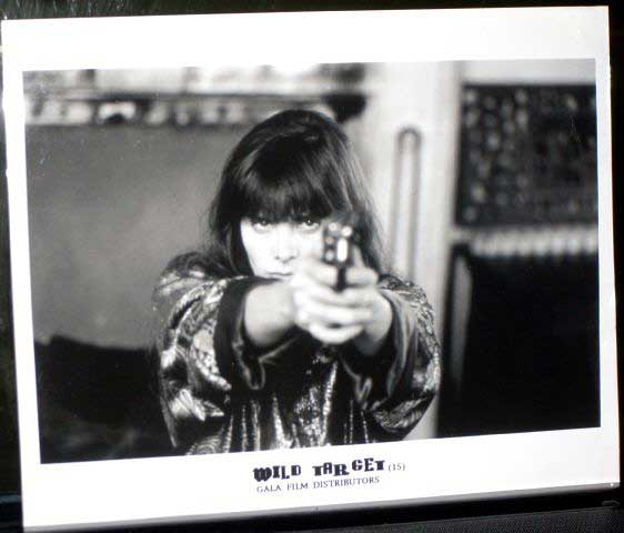 WILD TARGET: Publicity Still Woman Pointing Gun